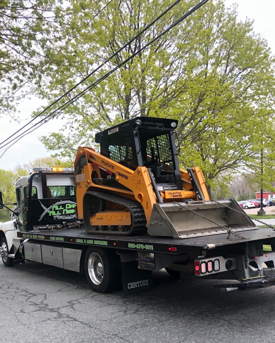 Tracked skid steer on the flatbed